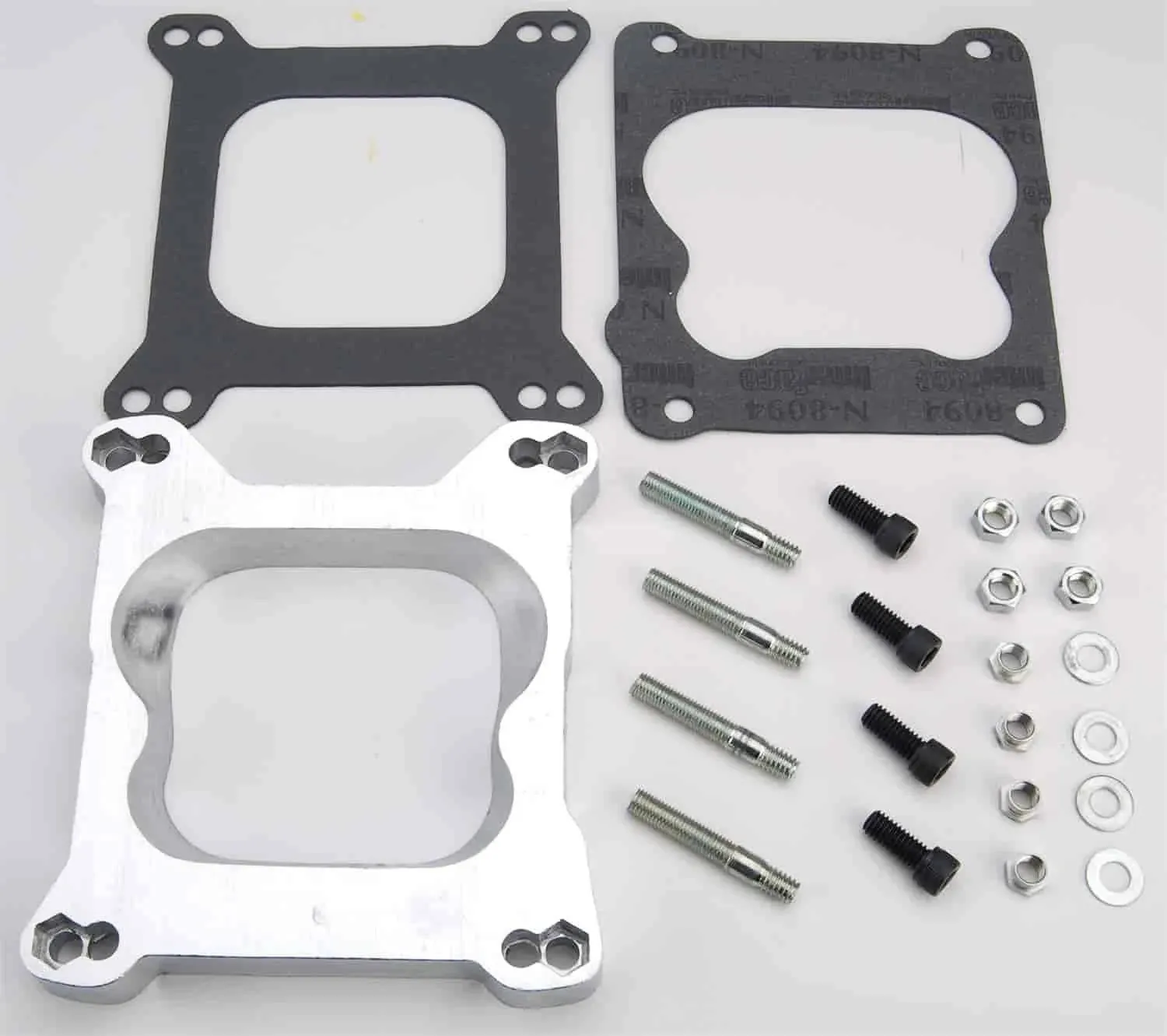 JEGS 4-Barrel Carburetor Adapter Kit | Aluminum | Open | 3/4 Inch Thick | Includes Adapter, Gaskets, And Hardware