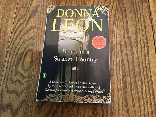 Death in a Strange Country: A Commissario Guido Brunetti Mystery (The Commissario Guido Brunetti Mysteries, 2)