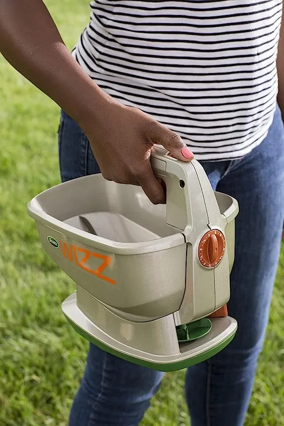 Scotts Wizz Spreader for Grass Seed, Fertilizer, Salt and Ice Melt, Handheld Spreader Holds up to 2,500 sq. ft. of Product
