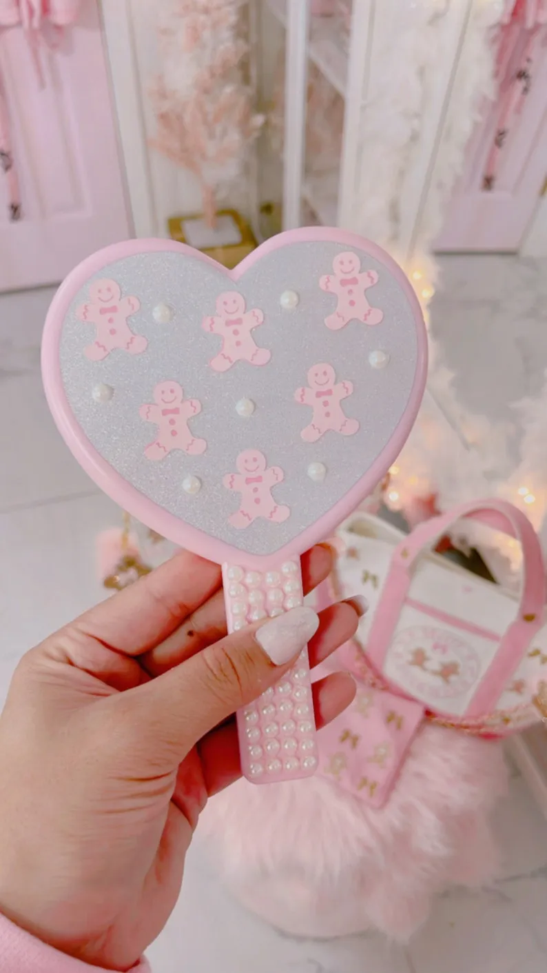 Heart shaped handheld mirror