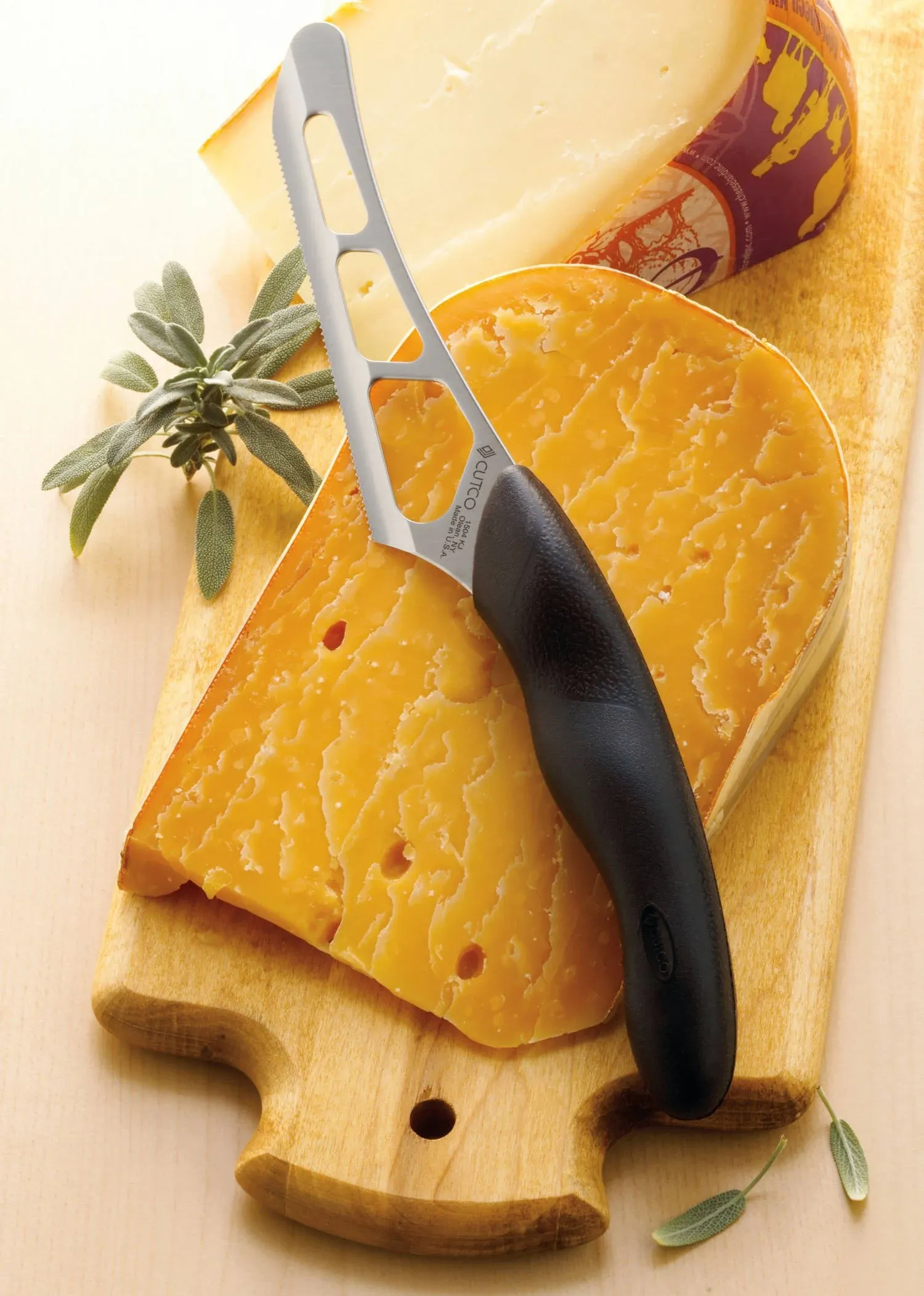 Cutco Model 1504 Soft Handle Cheese Knife --- 5.5" Stainless Blade & 5" Black Handle.