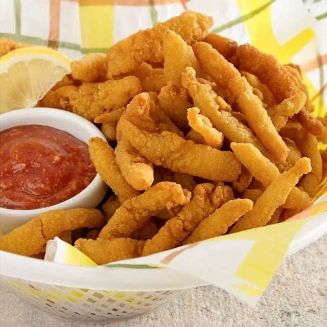 Sea Watch Captain Freds Breaded and Fried Clam Strip, 4 OUNCE - 24 per case.