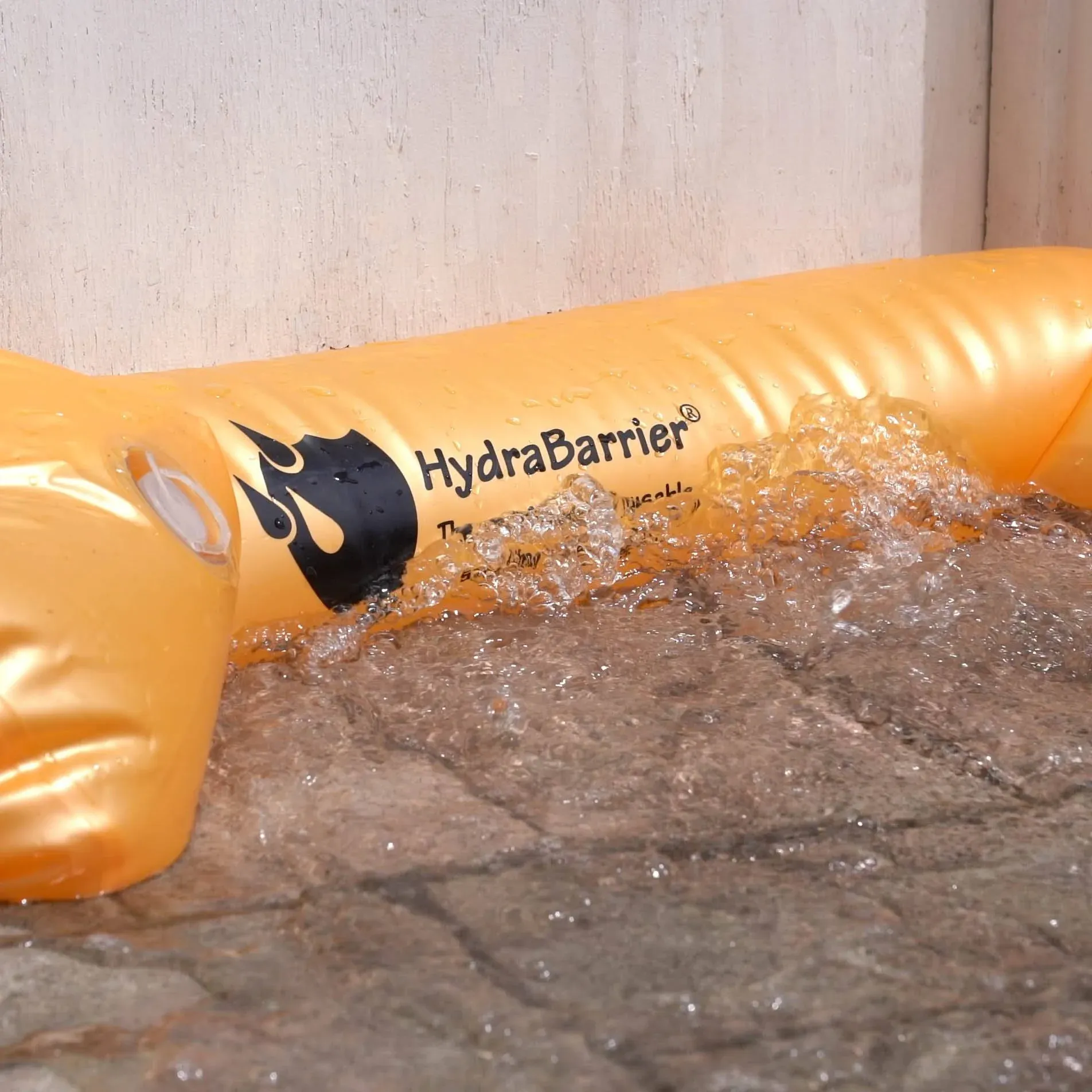 Best Sandbag Alternative Hydrabarrier Standard 6 Foot Length 4 inch Height Water Diversion Tubes That Are The Lightweight Re-Usable and Eco-Friendly