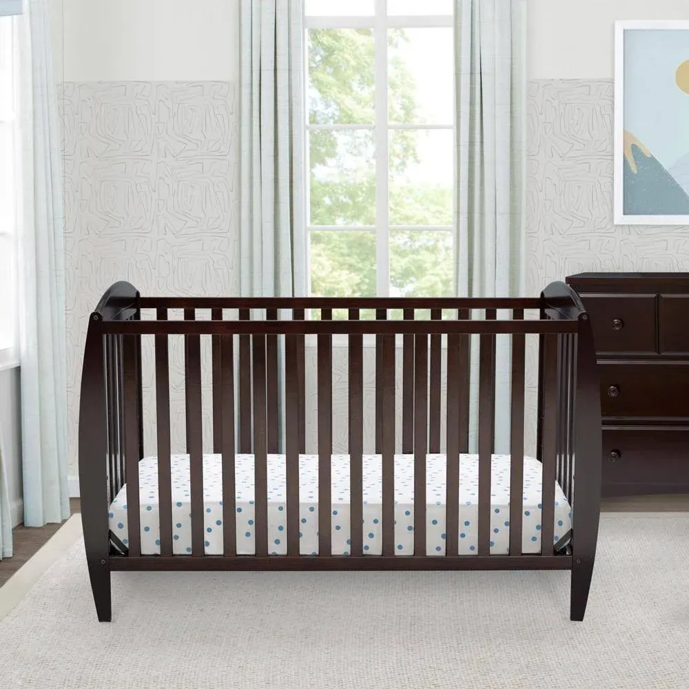 Delta Children Taylor 4-in-1 Convertible Baby Crib, Easy to Assemble, Sustainable New Zealand Wood, JPMA Certified, Dark Chocolate