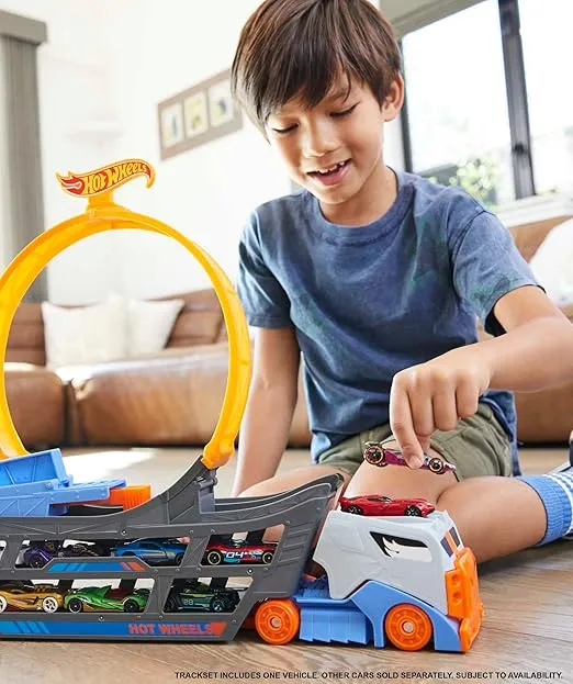 Hot Wheels Toy Car Track Set, Stunt & Go Playset with 1:64 Scale Vehicle, Transforming Hauler Truck with Loop & Launcher, Stores 18 Vehicles