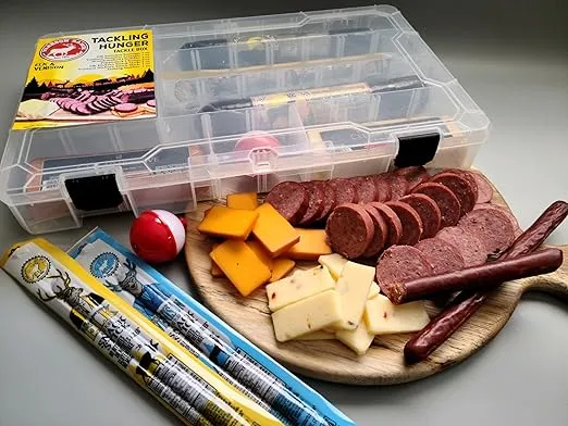 PEARSON RANCH SINCE 1959 Tackling Hunger Tacklebox Exotic Meat Gift Set Includes Elk and Venison Summer Sausage,2 Blocks of Cheese, 2 Meat Sticks and Fishing Bobber - Charcuterie Gift for Him