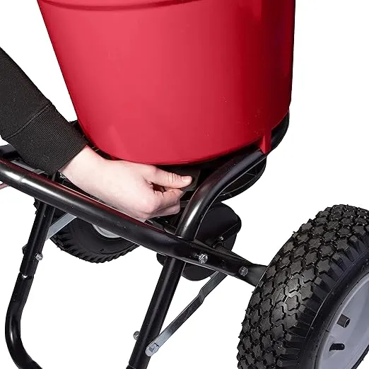 EarthWay 2150 50 LB (22 KG) Commercial Broadcast Fertilizer Spreader. Red, Heavy-Duty Walk-Behind Push Garden Seeder with Adjustable Drop Rate and Driving Handle. Large 13 in Pneumatic Stud Tires