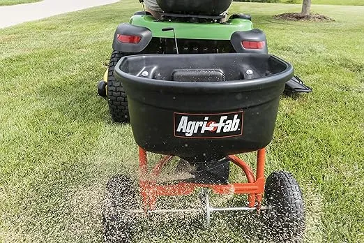 Agri-Fab 45-0527 110 lb. Tow- Behind Lawn & Garden Broadcast Spreader for Seed,Fertilizer,Salt,Ice Melt; Easy to use Flow Control from Seat of Riding Lawn Mower