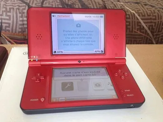 Nintendo DSi XL - Red (Super Mario Bros. 25th Anniversary Edition) by Nintendo (Renewed)