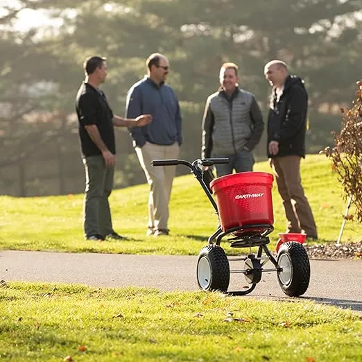 EarthWay 2150 50 LB (22 KG) Commercial Broadcast Fertilizer Spreader. Red, Heavy-Duty Walk-Behind Push Garden Seeder with Adjustable Drop Rate and Driving Handle. Large 13 in Pneumatic Stud Tires