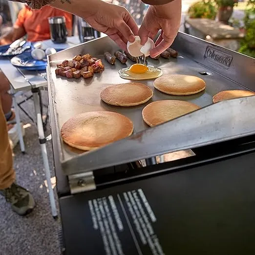 Coleman RoadTrip Griddle, 19"/24" Propane Griddle with Instastart Ignition, Even Heat Distribution, Grease Tray & Optional Lid; Portable Griddle with Scissor Legs & Wheels for Camping & Tailgating