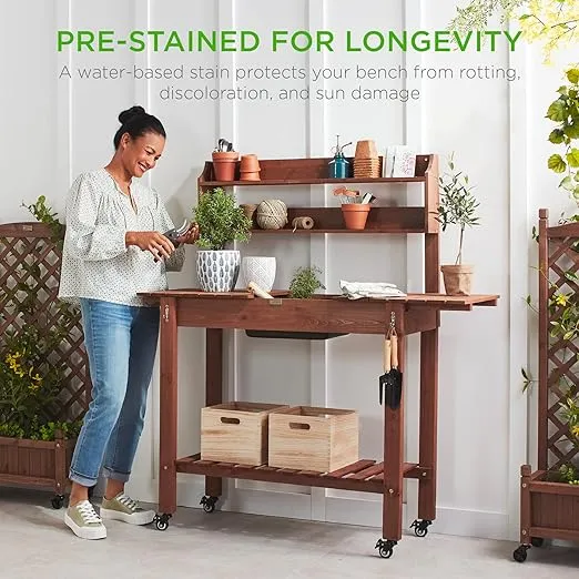 Best Choice Products Mobile Garden Potting Bench, Outdoor Wood Workstation Table w/Sliding Tabletop, 4 Locking Wheels, Food Grade Dry Sink, Storage Shelves - Brown Stain Finish