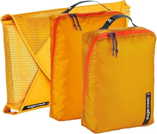Eagle Creek Pack-It Starter Set - Suitcase Organizer Bags Set with Wrinkle-Free Garment Folder and Travel Packing Cubes, Sahara Yellow